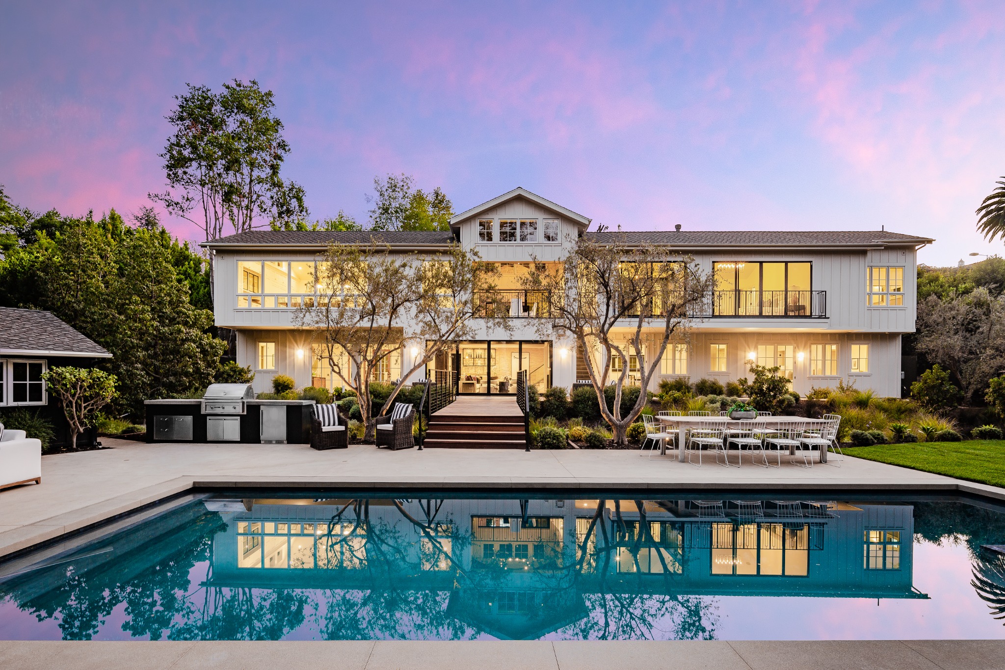 Canyon View residence, rear elevation and pool at twilight